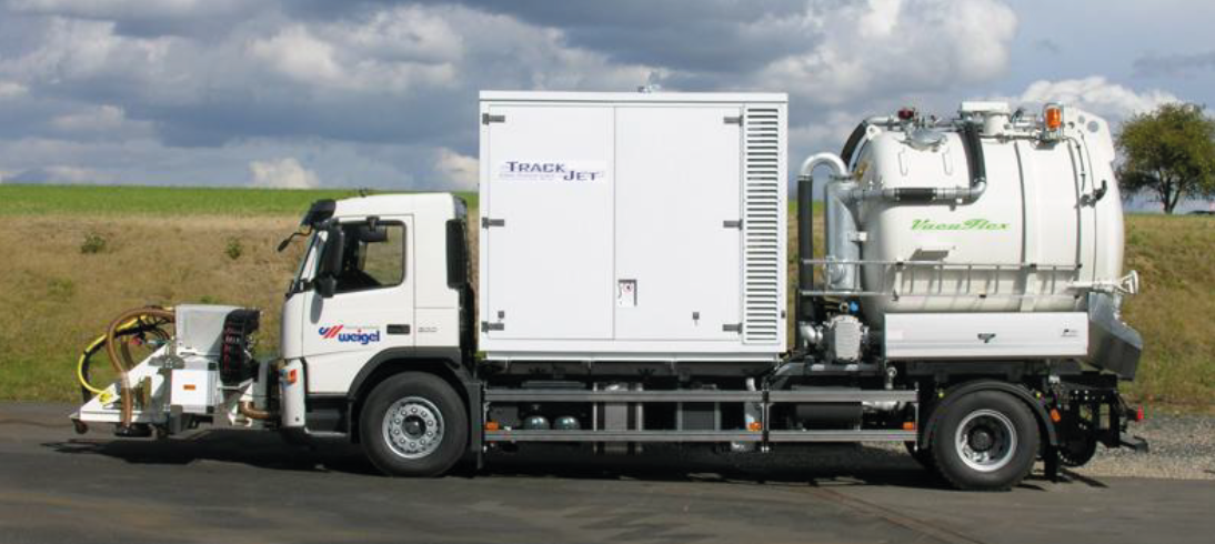 Rubber removal and re-stripe, Runway Contract # F38604-03-C-0005